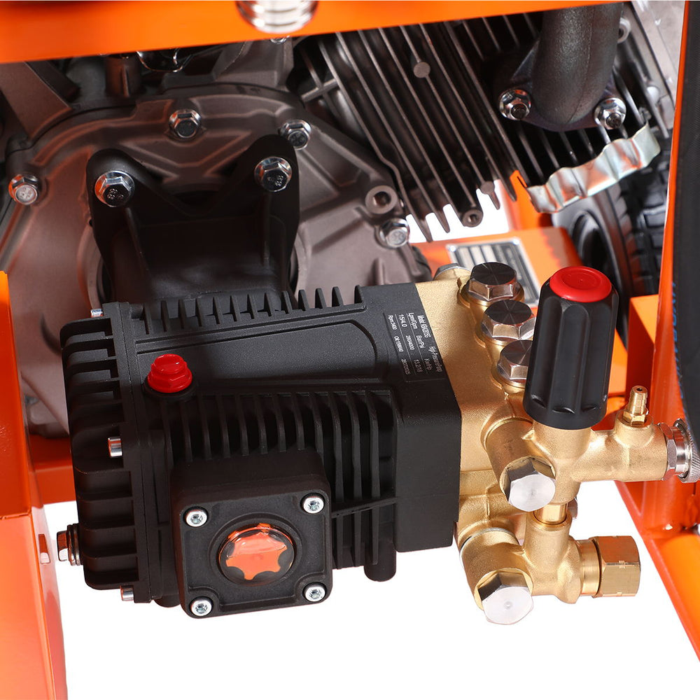 Detail view of industrial triplex pump and fittings on TMG Industrial 4000 PSI Gas Pressure Washer